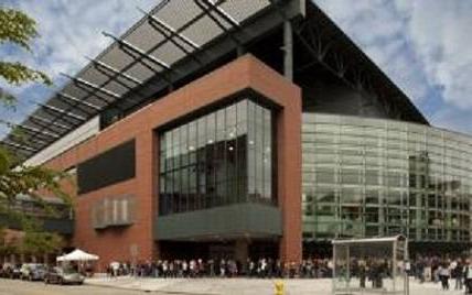 Van Andel Arena front entrance with flags